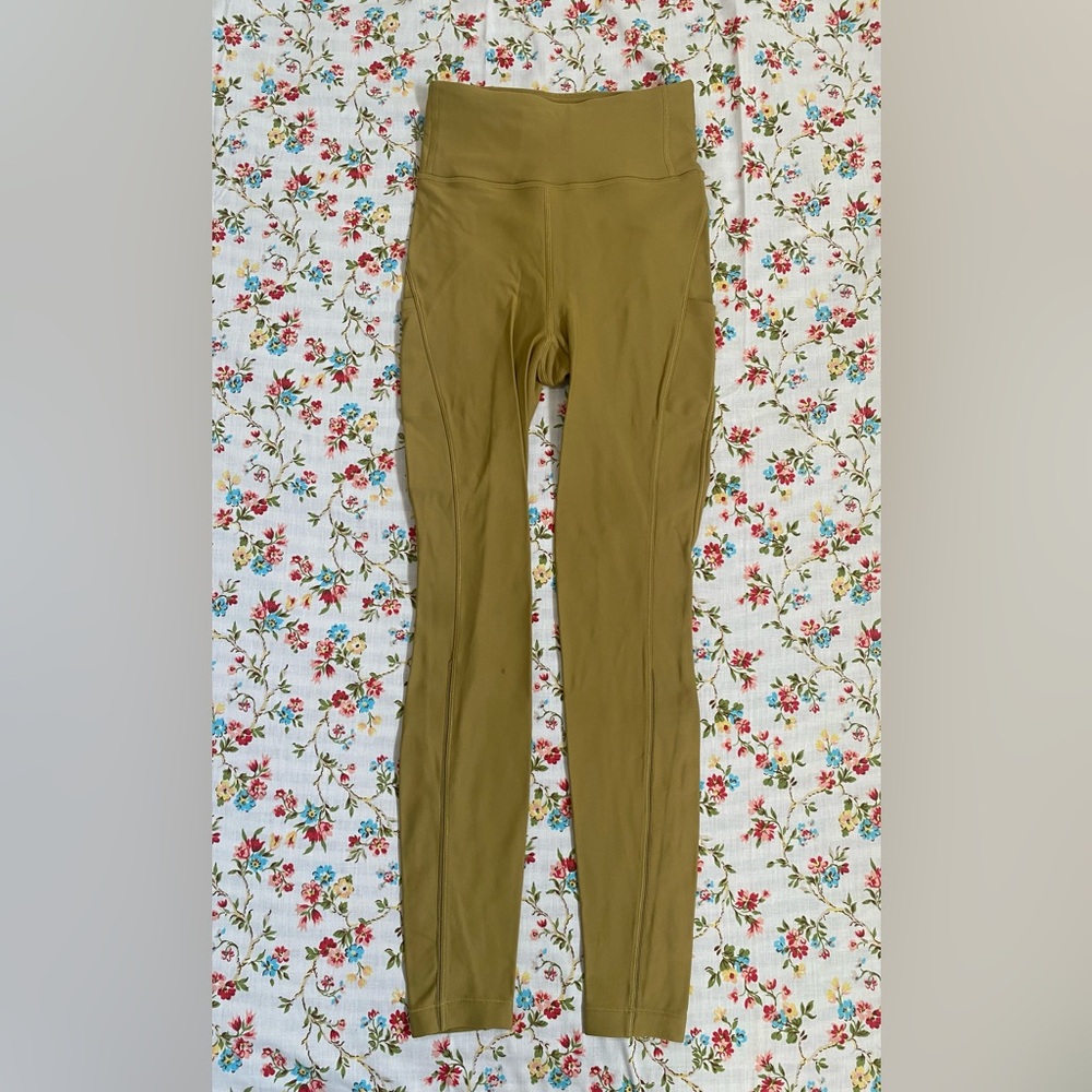 Lululemon leggings gold size 4, 28” inseam.